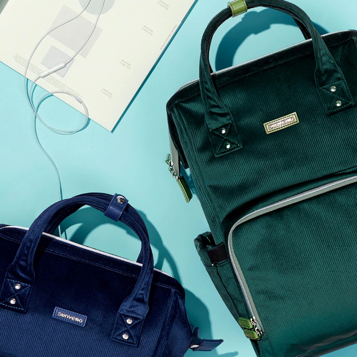 صنفينو حقيبة حفاضات باللون الأخضر للأطفال