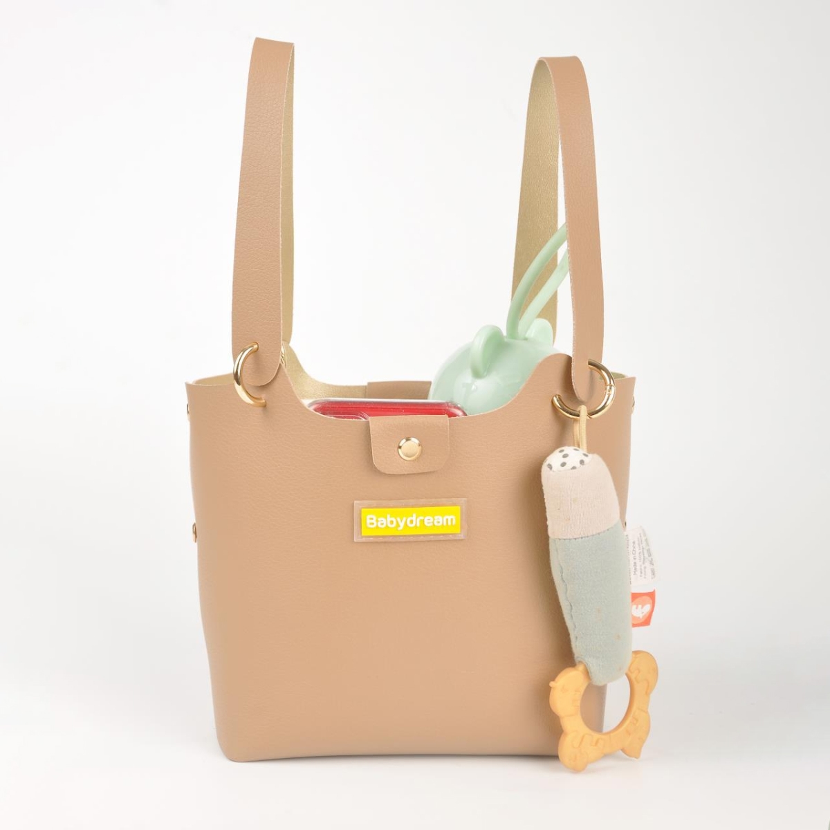 بيبي دريم حقيبة حفاضات جلدية بلون بيج للجنسين من عمر 13 سنة فما فوق