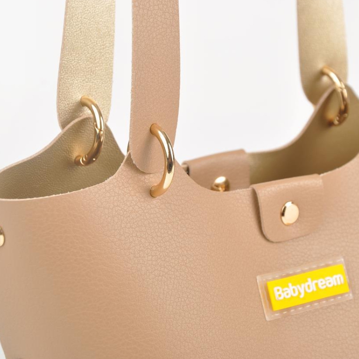 بيبي دريم حقيبة حفاضات جلدية بلون بيج للجنسين من عمر 13 سنة فما فوق