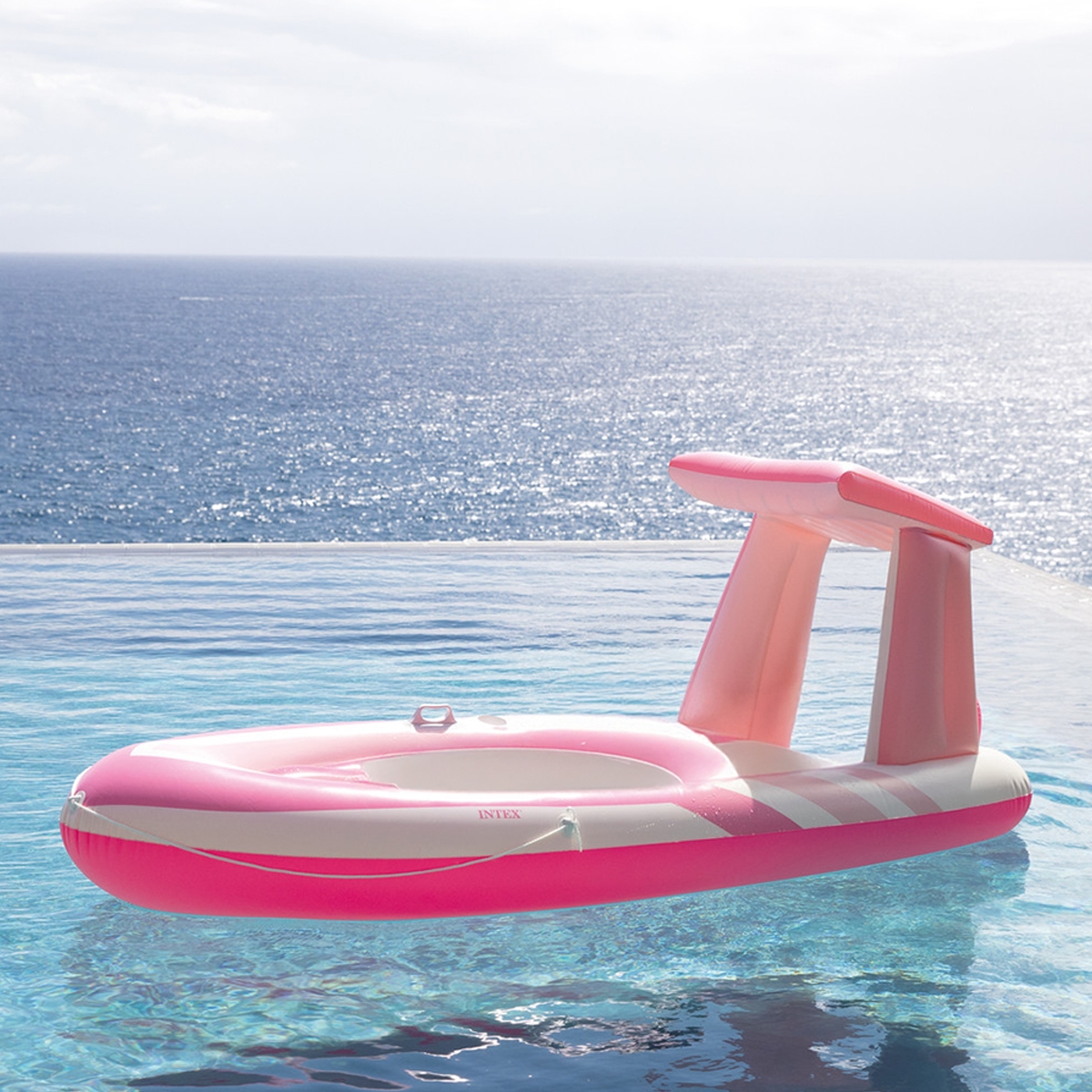 إنتكس عوامة قارب بينك بارادايس للمسبح مع مظلة، للجنسين، من عمر 13 سنة فما فوق