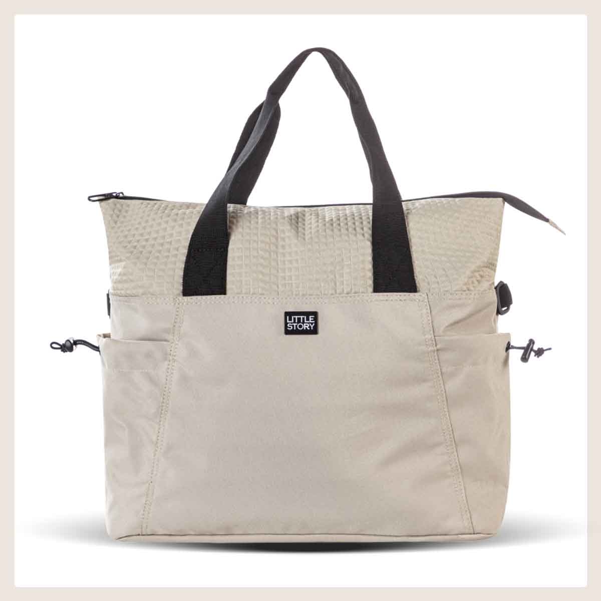 ليتل ستوري حقيبة حفاضات للأم باللون البيج مع سجادة تغيير